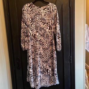 Animal print. Size medium dress. Shorter in front and longer in back.